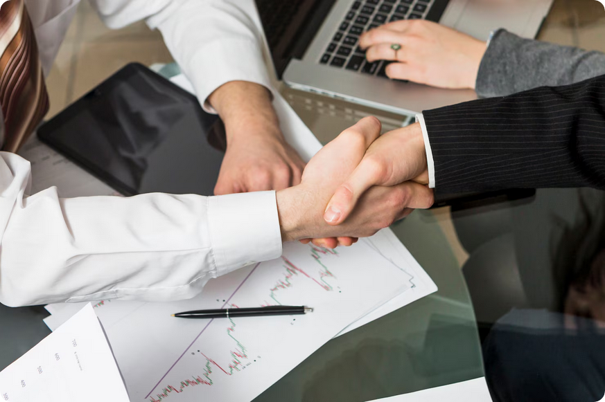 Hands exchanging paperscontracts or shares